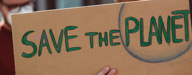 Ein Schild auf einer Demonstration mit der Aufschrift "Save The Planet"