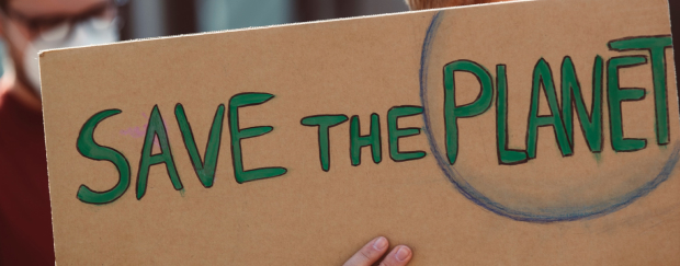 Save The Planet Ein Schild auf einer Demonstration mit der Aufschrift "Save The Planet"
