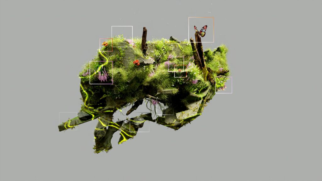 Grüner, moosbedeckter Käfer mit mehreren kleinen, farbigen Schmetterlingen und Blüten auf seinem Rücken vor grauem Hintergrund.
