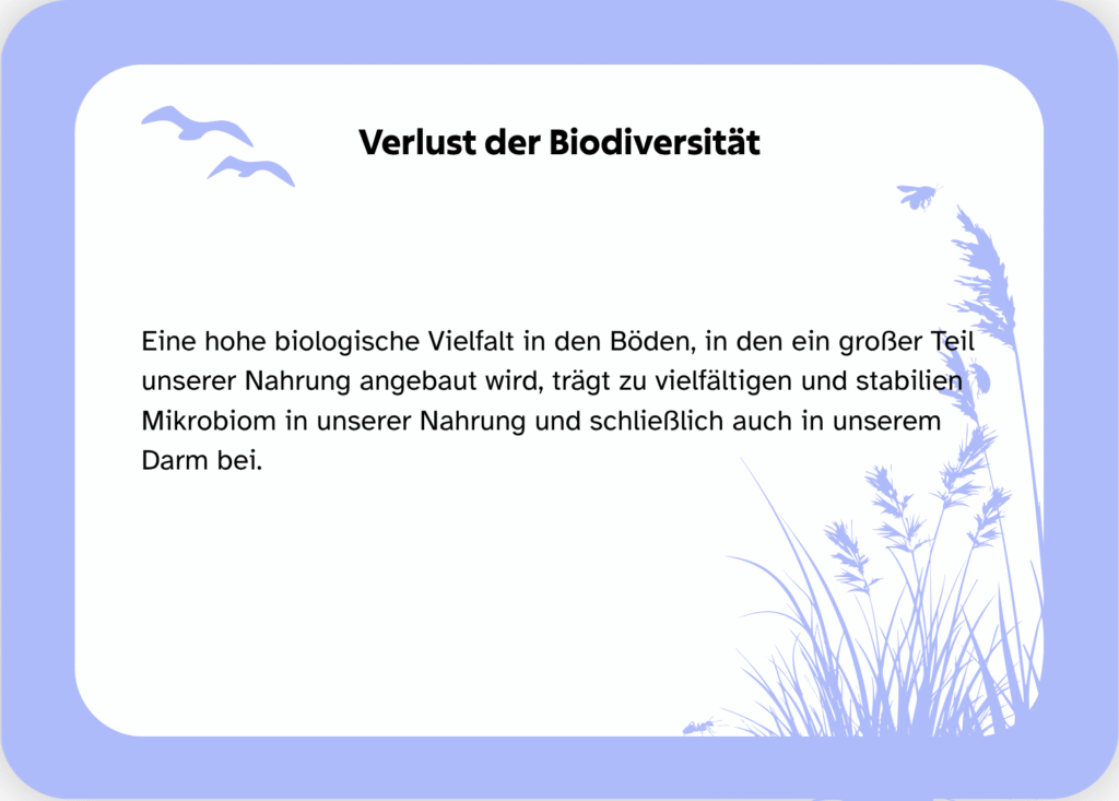 Bildkarte mit Text: Eine hohe biologische Vielfalt in den Böden, in den ein großer Teil unserer Nahrung angebaut wird, trägt zu vielfältigen und stabilien Mikrobiom in unserer Nahrung und schließlich auch in unserem Darm bei.